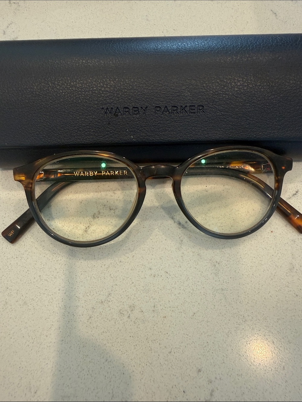 Warby Parker women’s  Tortoiseshell turning blue at bottom Round Glasses